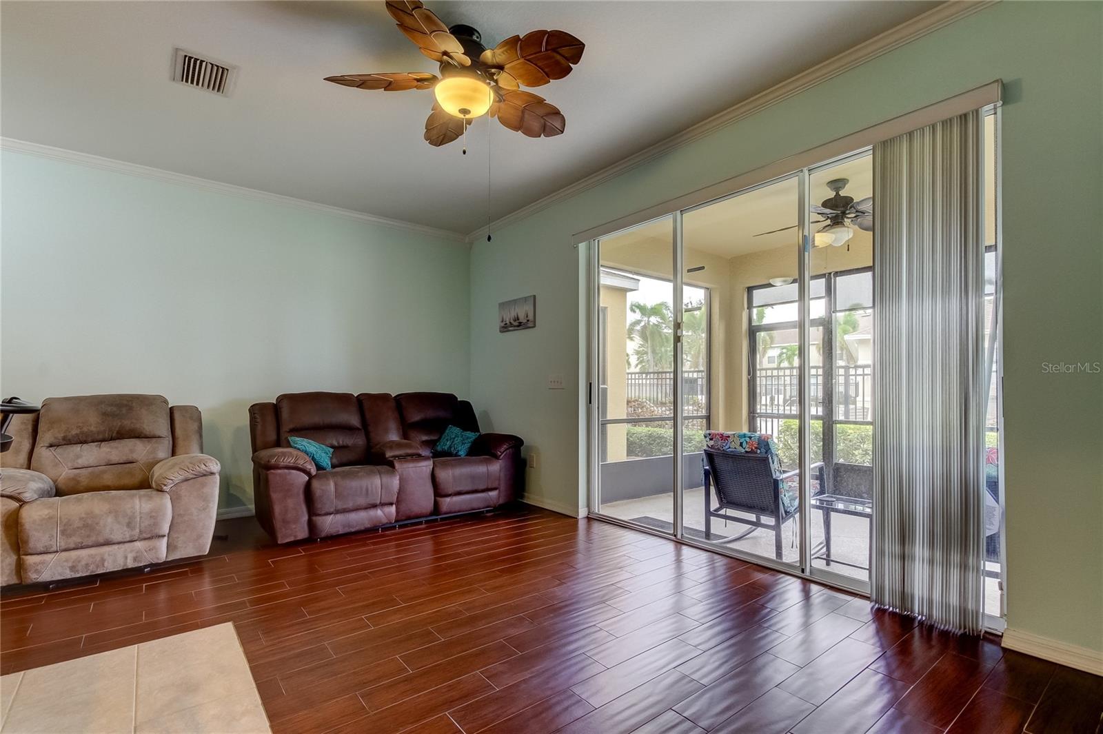 View of family room and screened lanai.