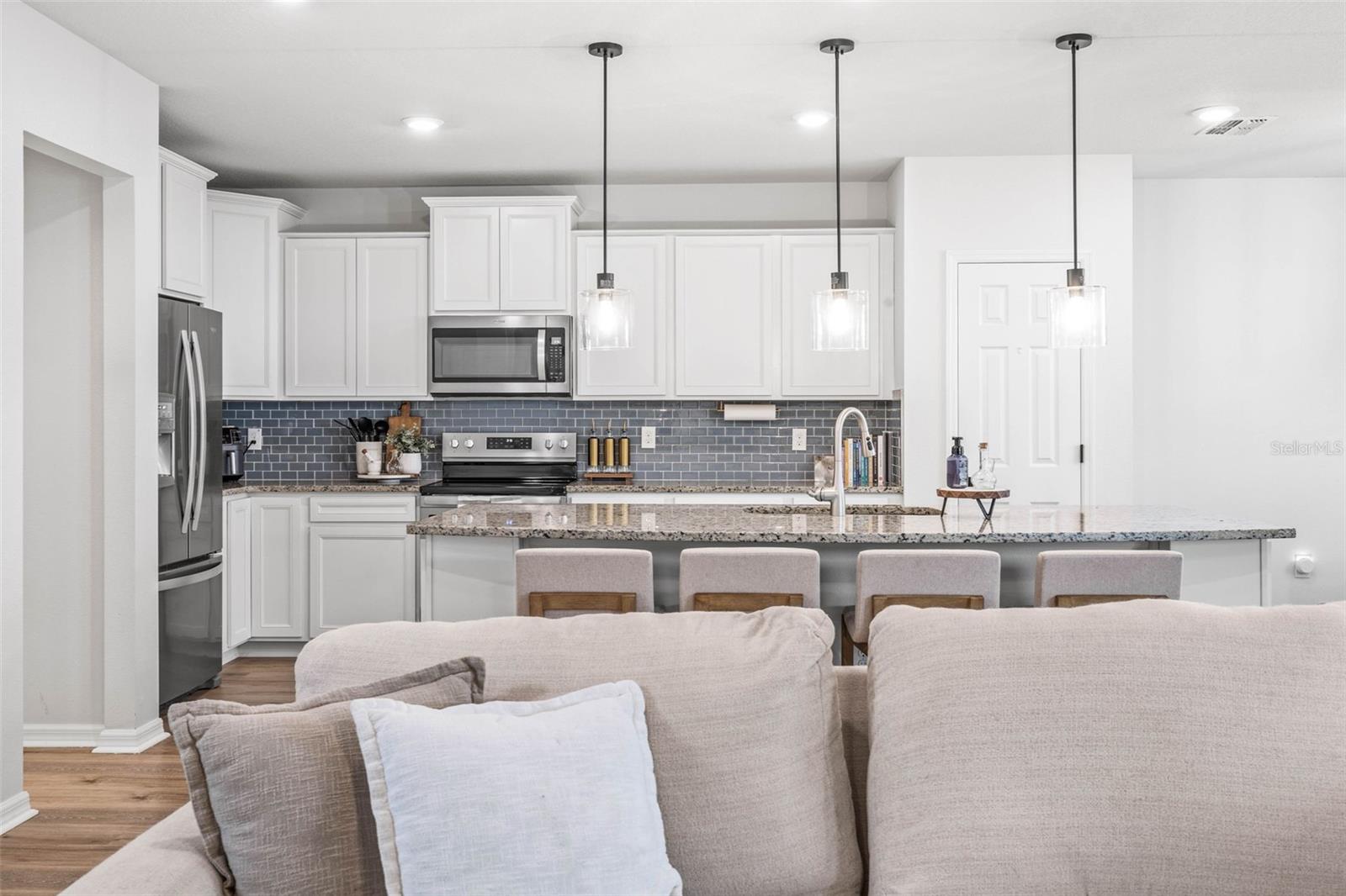 Overhead lighting fixtures throughout added to accent each designed room.