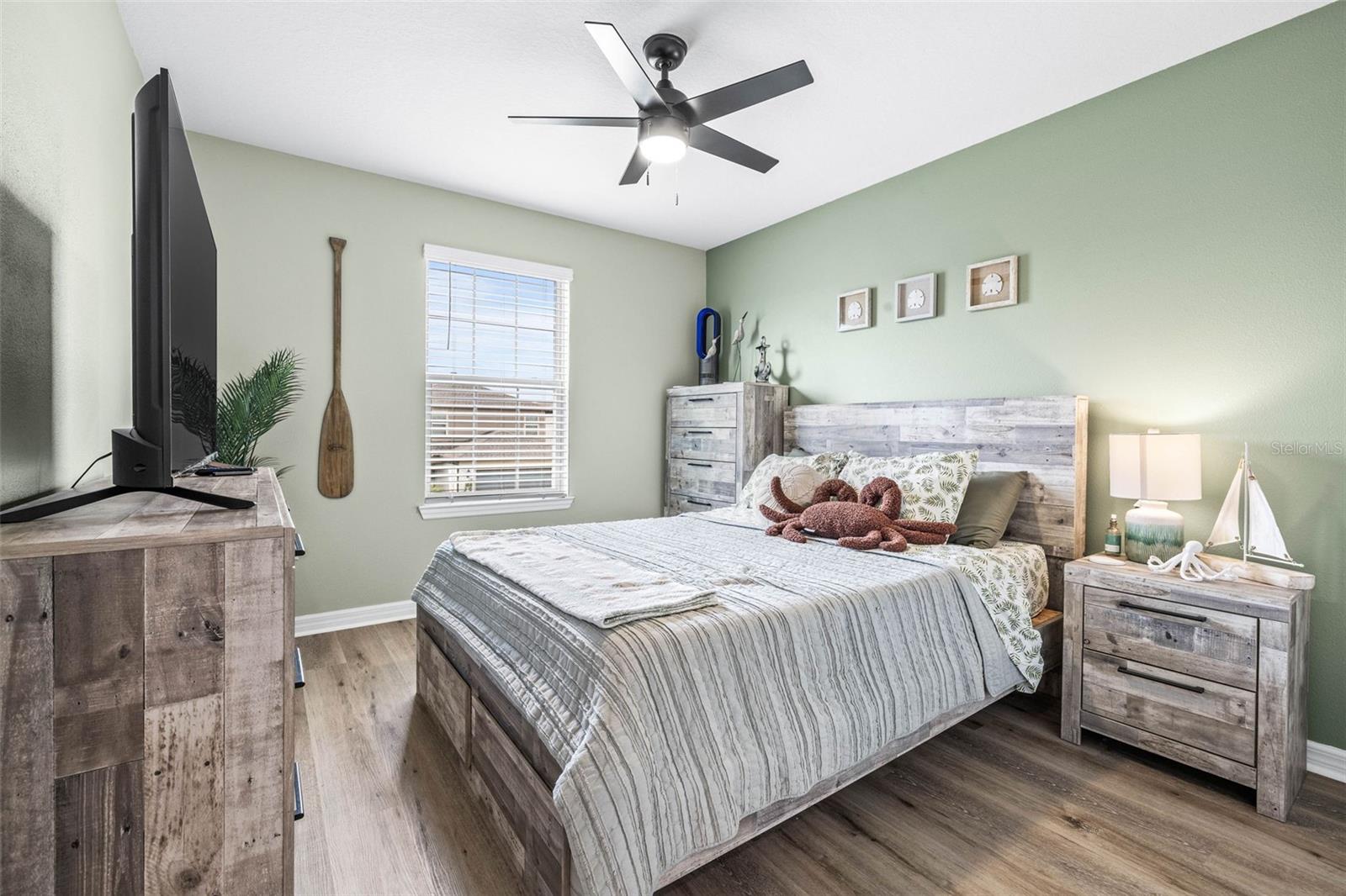 Bedroom 3 with overhead fan/lighting.