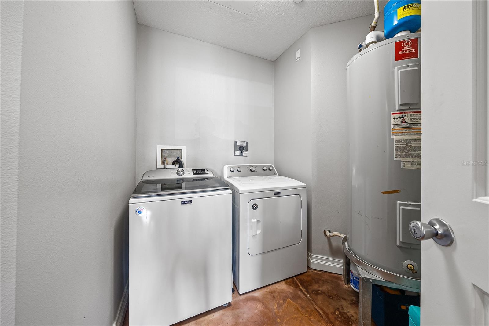 Large inside laundry room with room for storage