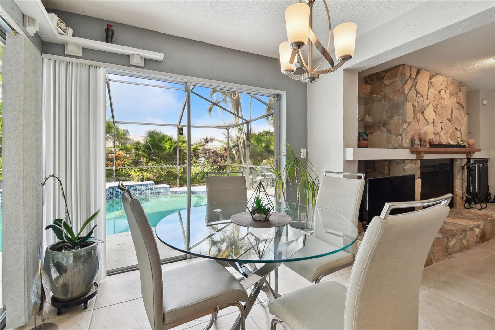 Breakfast nook overlooking the family room and pool