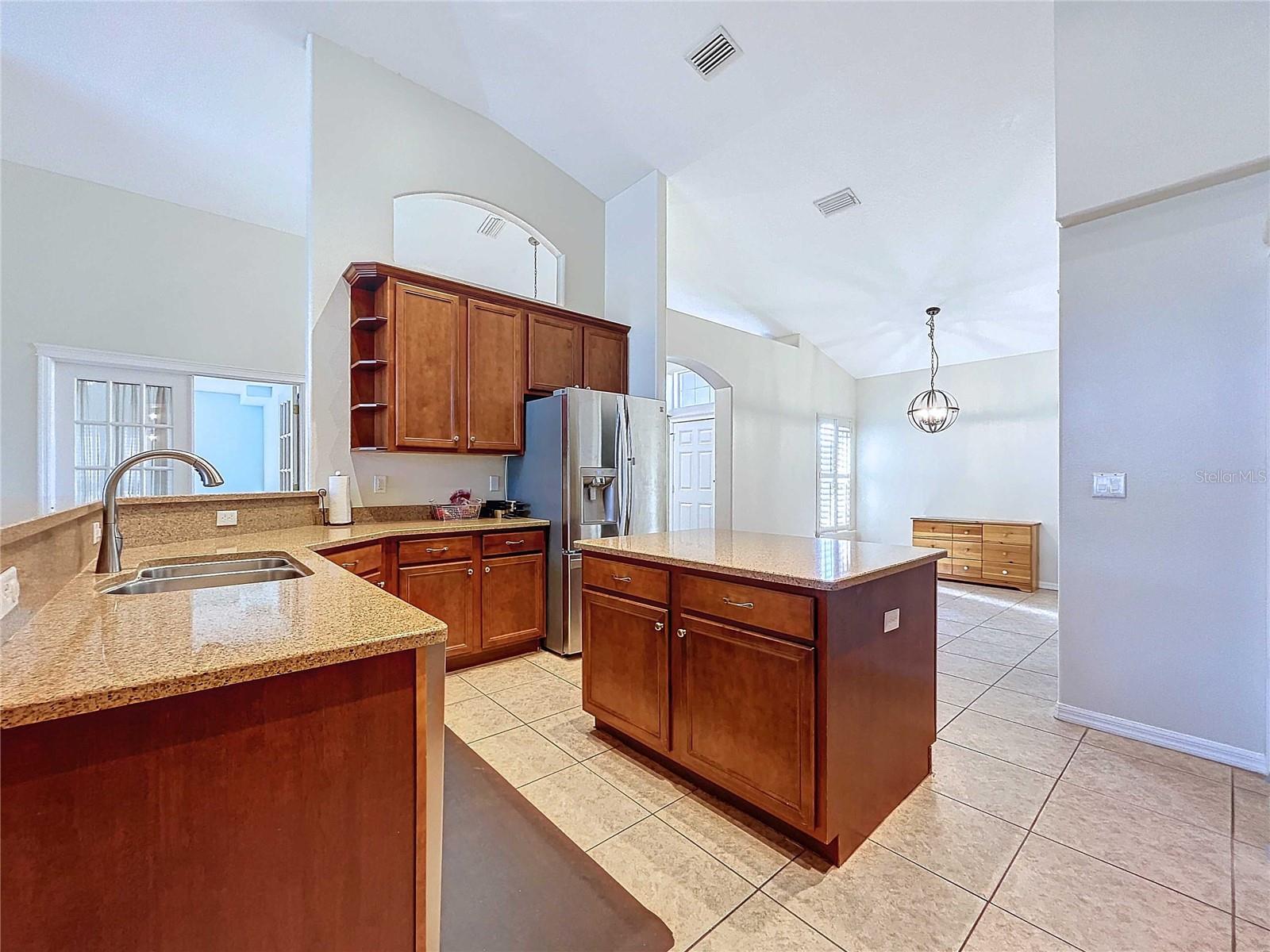 Kitchen featuring granite countertops & new paint