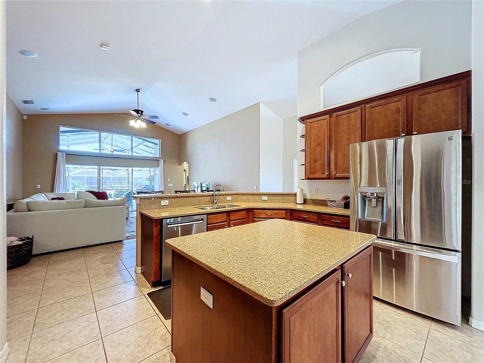 Kitchen & great room with soaring ceilings