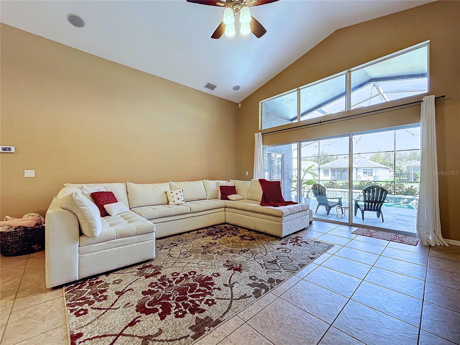 Great room with ceramic tile & high ceilings