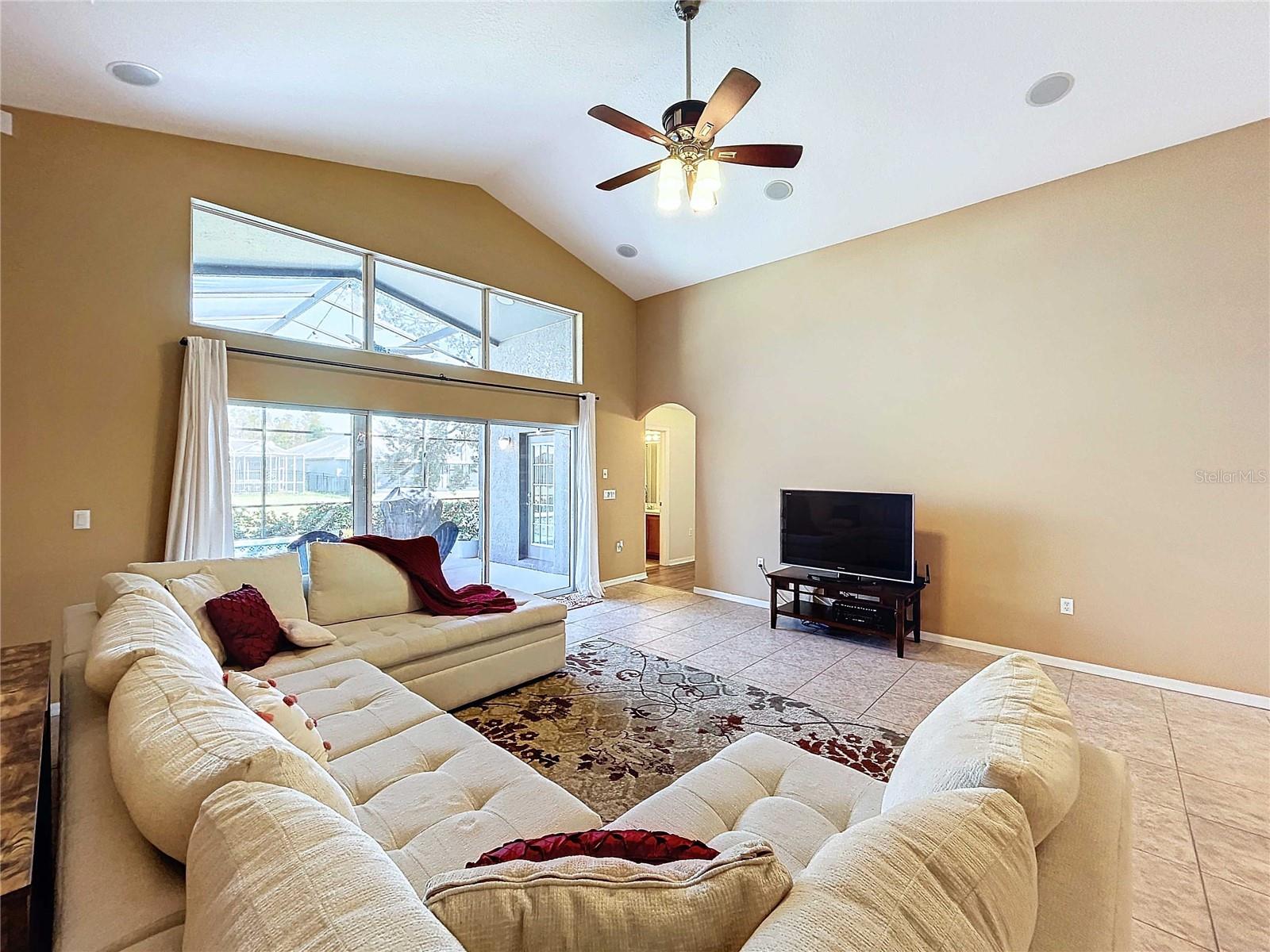 Great room upper window pours light in