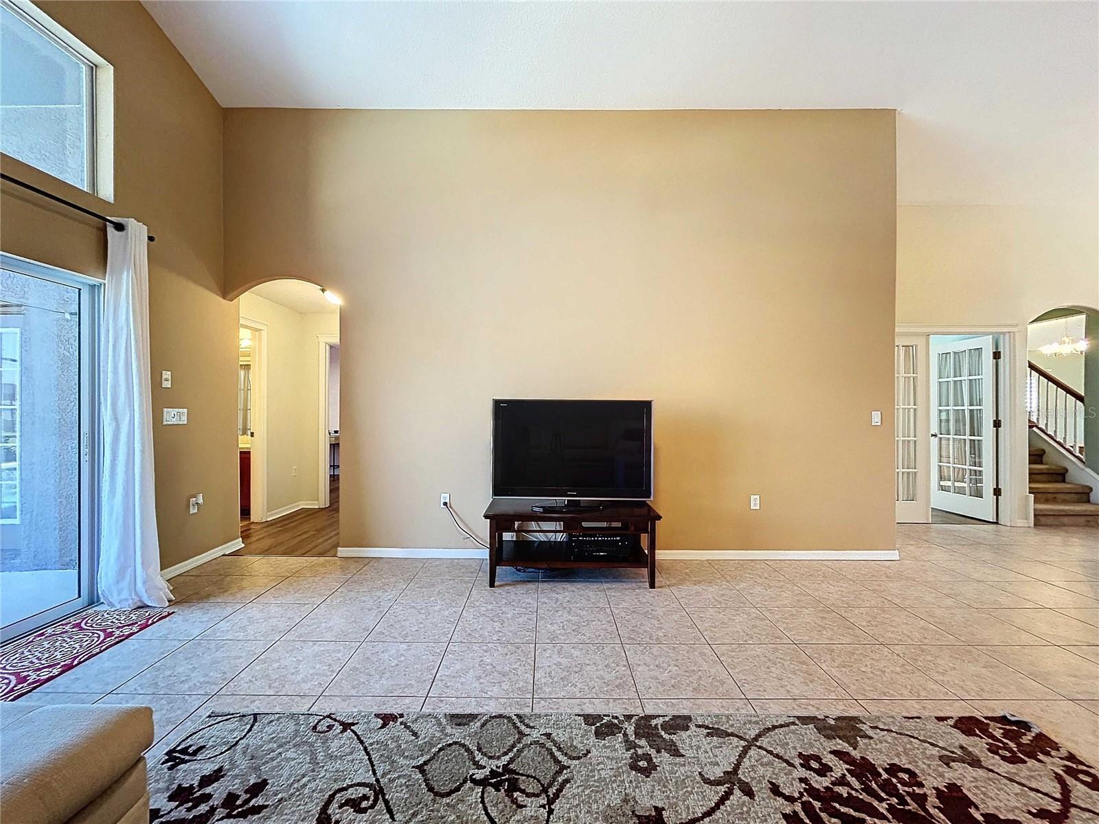 Great room featuring ceramic tile