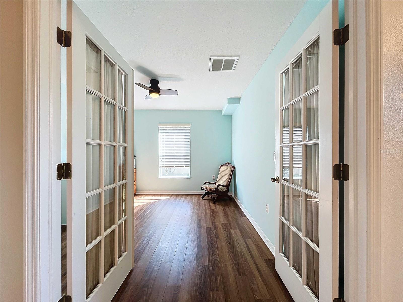 Double french doors opening to 4th bedroom/den