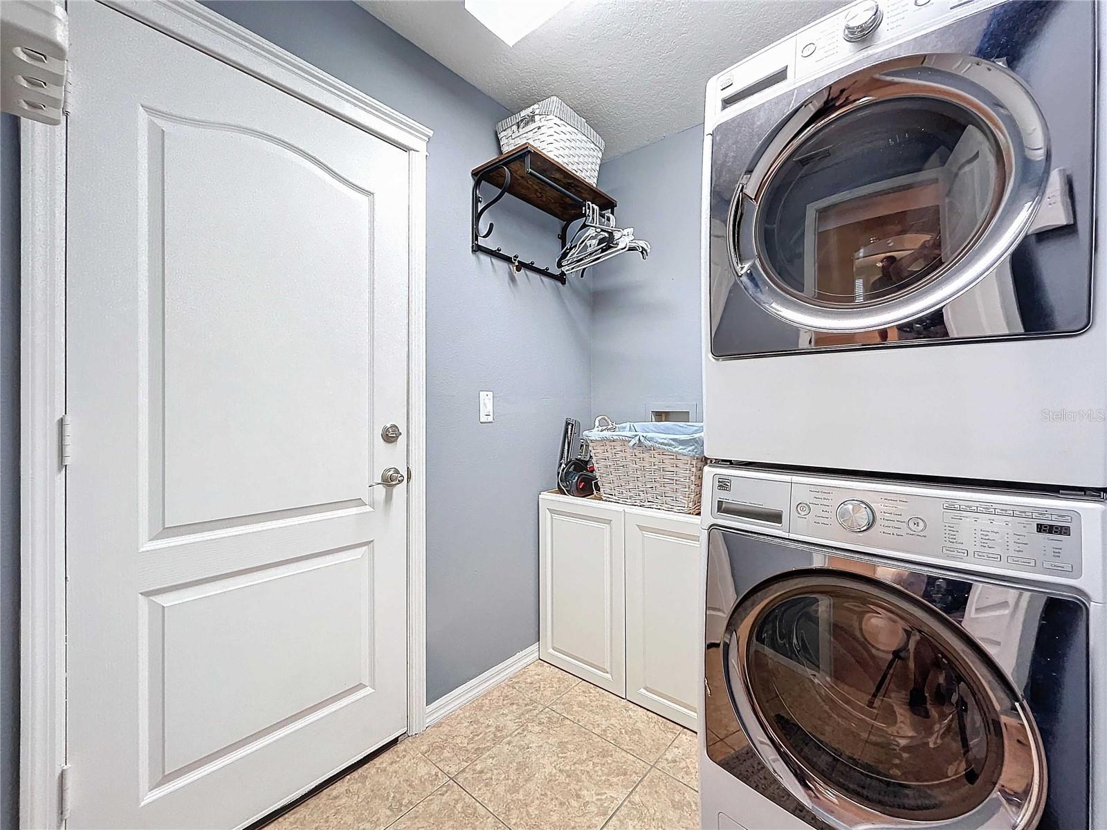 Laundry room with cabinets