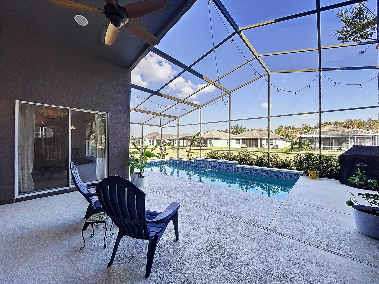 Covered lanai with outdoor speakers and new floor paint