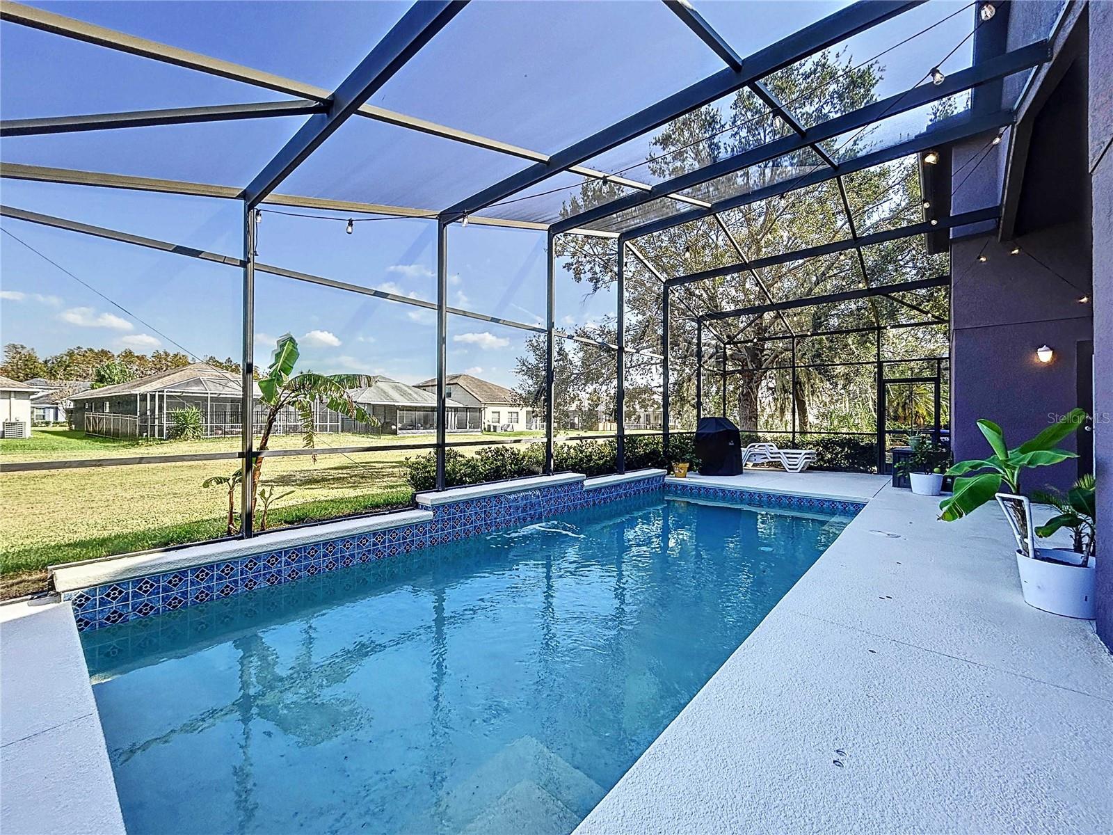 Saltwater pool with exterior lanai lighting