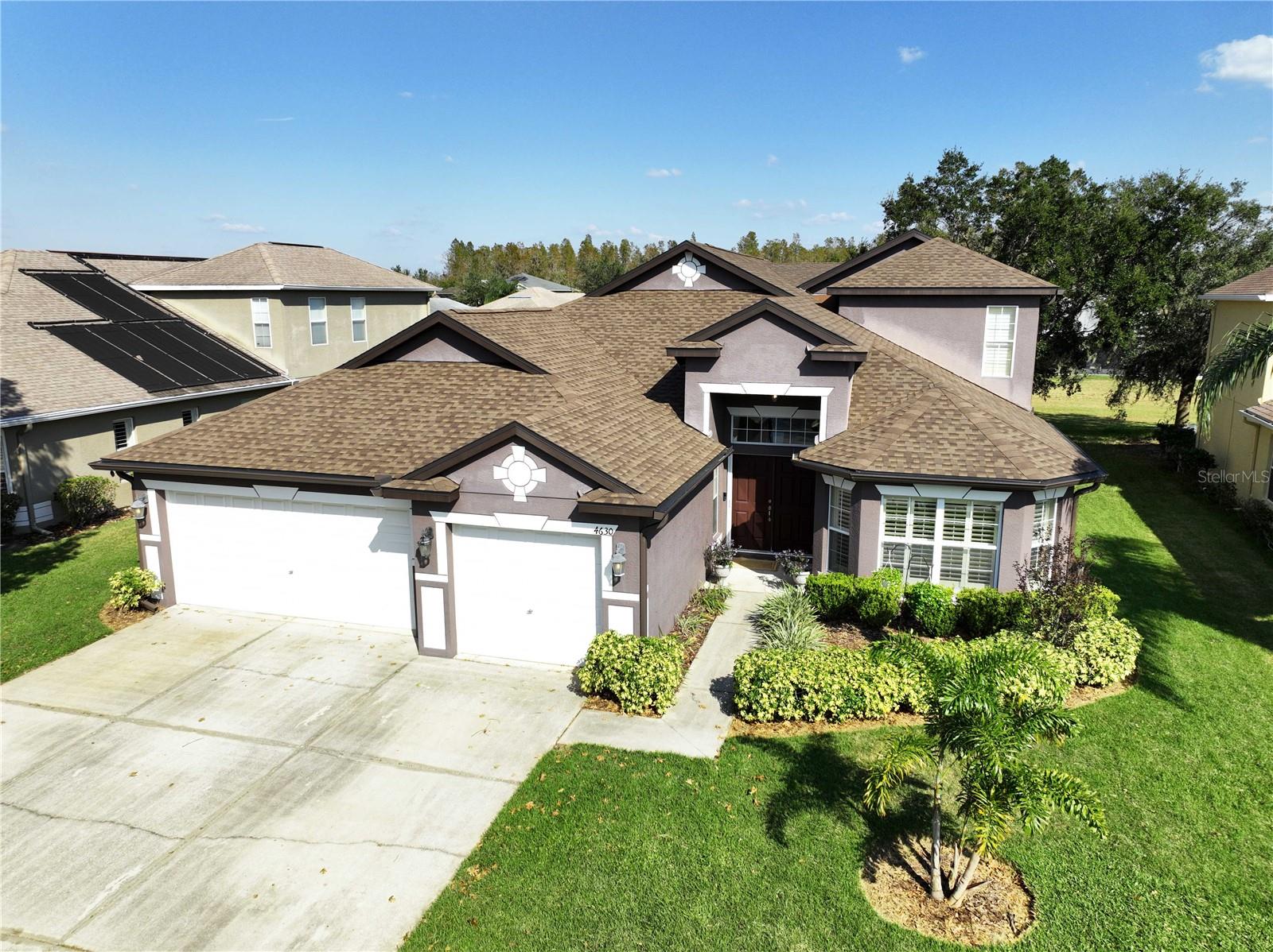 Front aerial view with new gutters & downspouts 2023