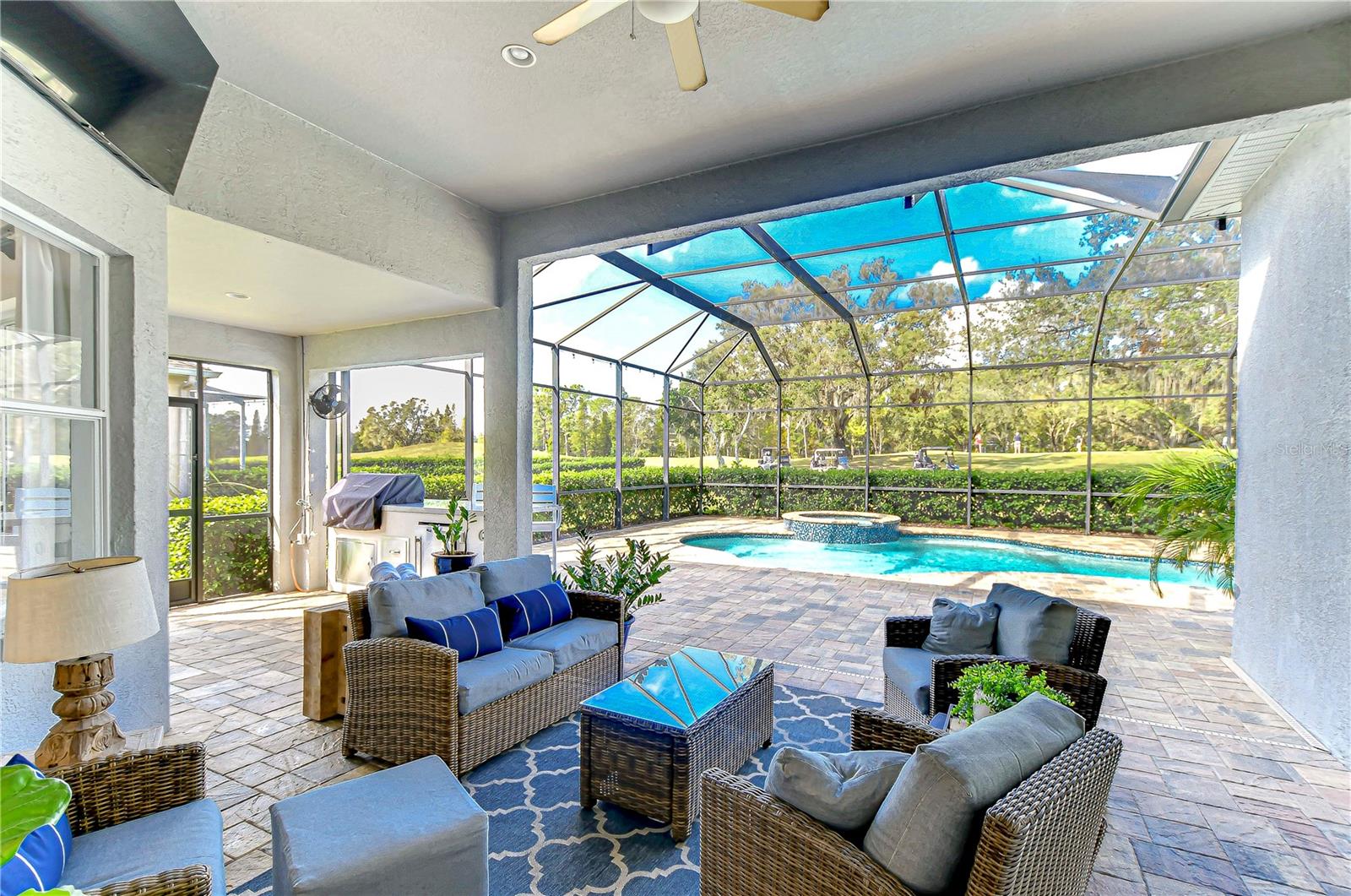 Massive screened lanai is perfect for entertaining or unwinding!