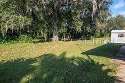 Screen Room Overlooks Private Back Yard