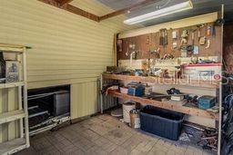 Work room under covered patio for shade while working