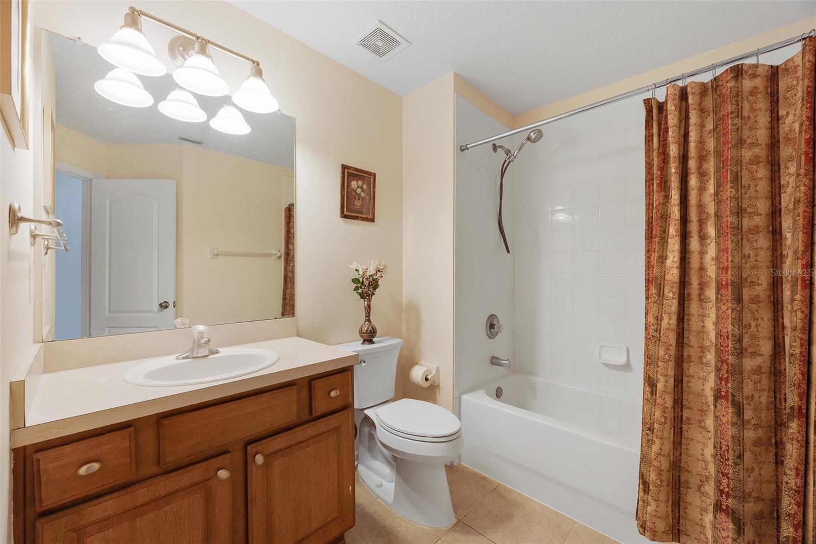 The upstairs hall bathroom has a tub/shower combination.