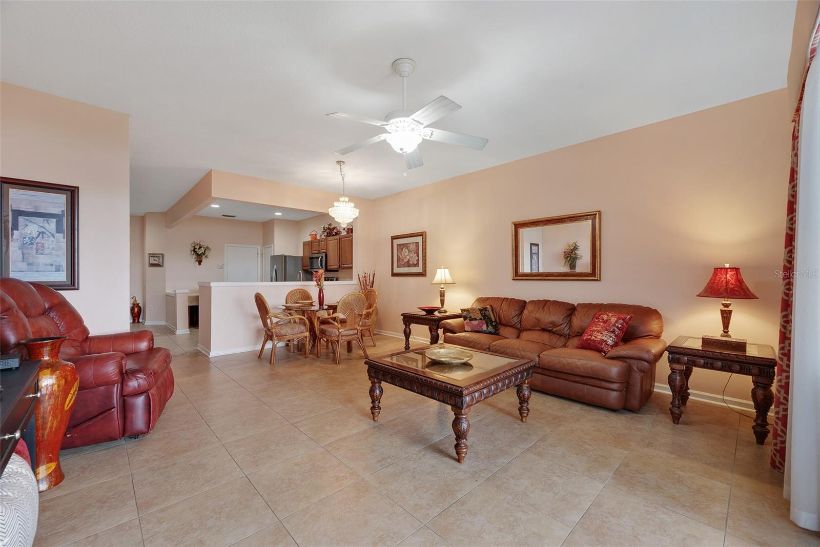 View of living room from the glass sliding door with plenty of room for a dining table.