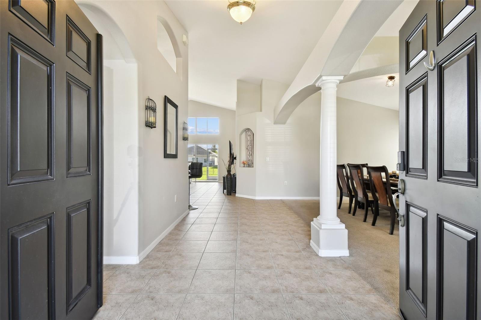 Ample Family Room with tile flooring