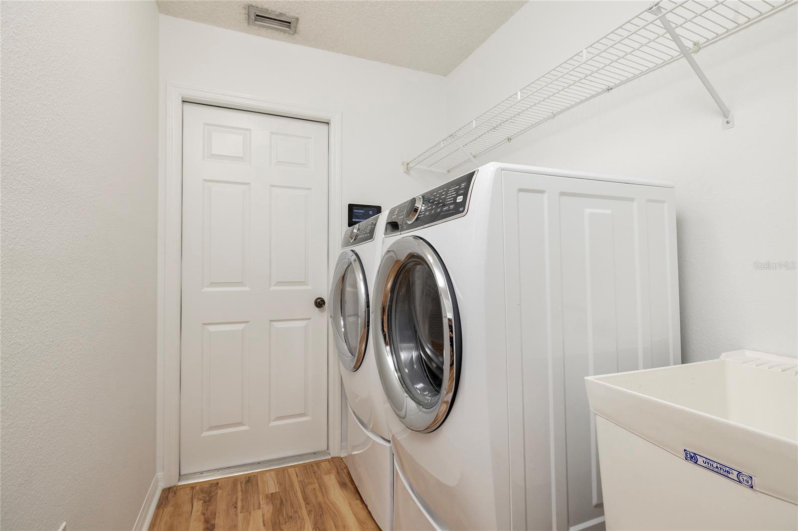 Inside Laundry room with washer/dryer