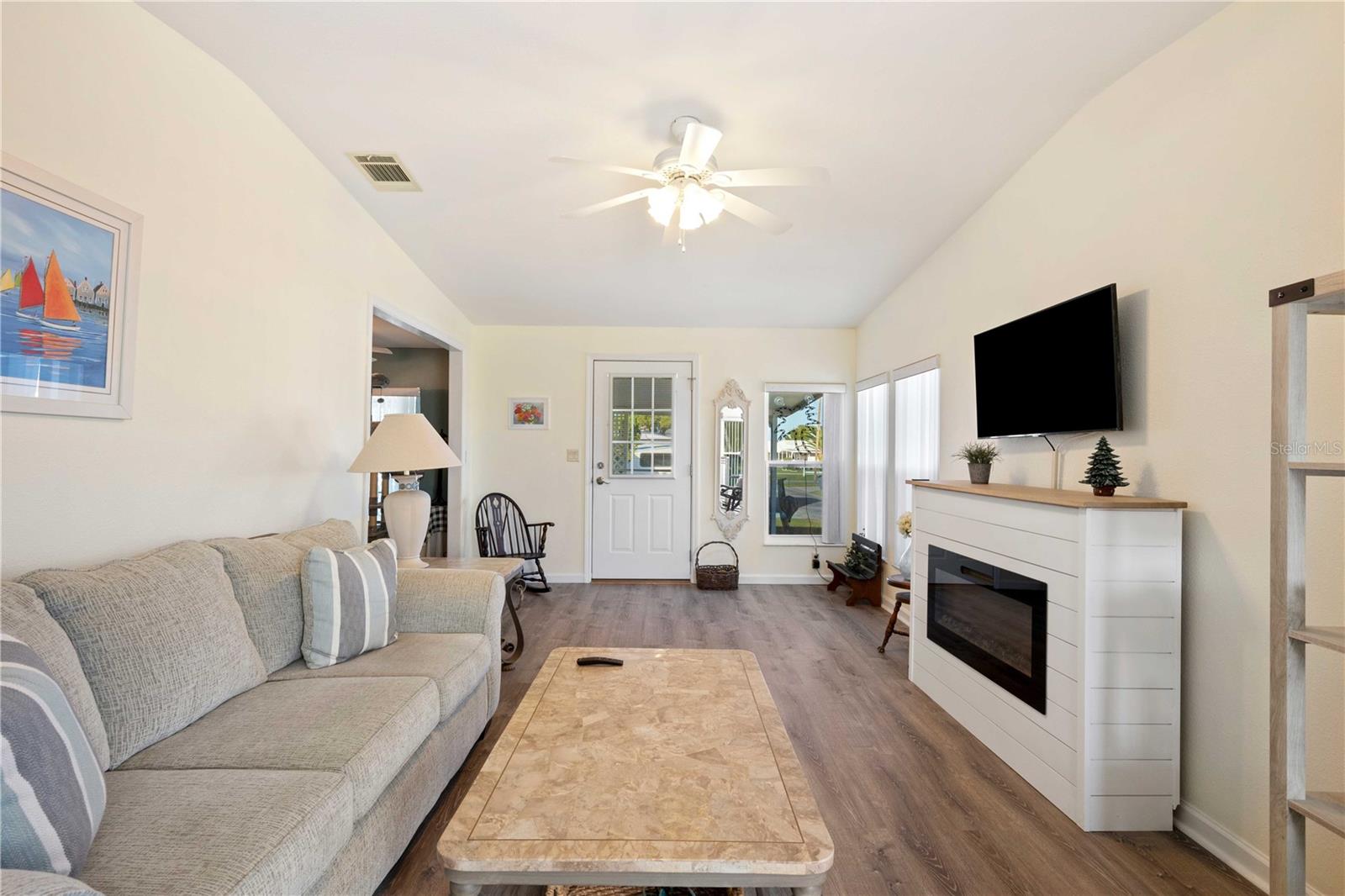 Entry from carport into Florida/bonus room.