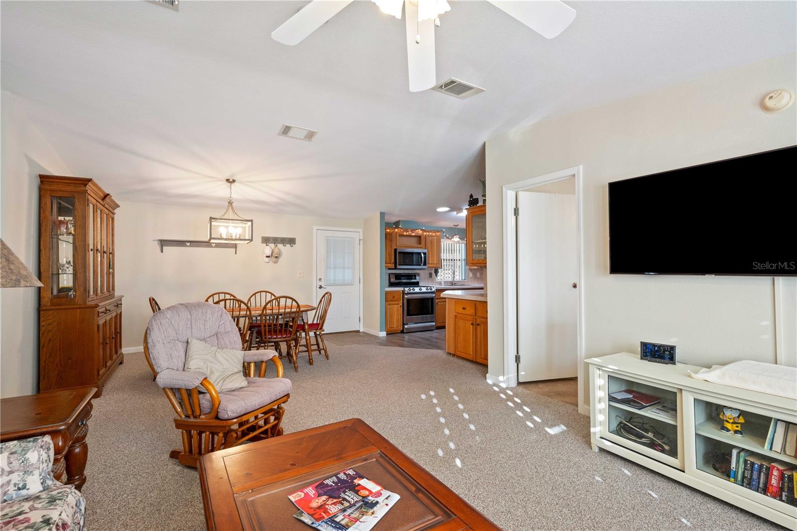 Living room is open concept with dining area.