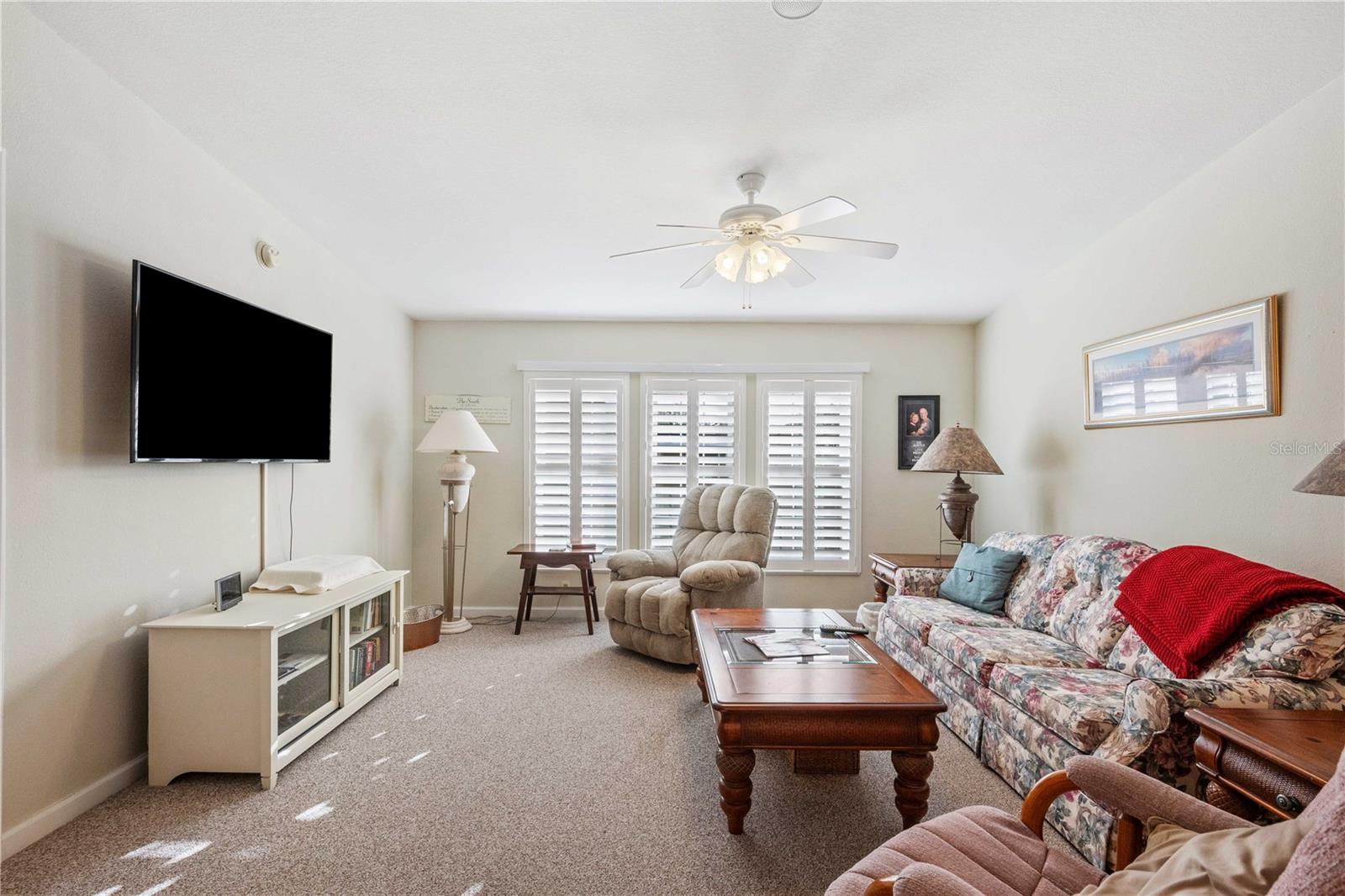 Primary bedroom has king size bed and walk-in closet.