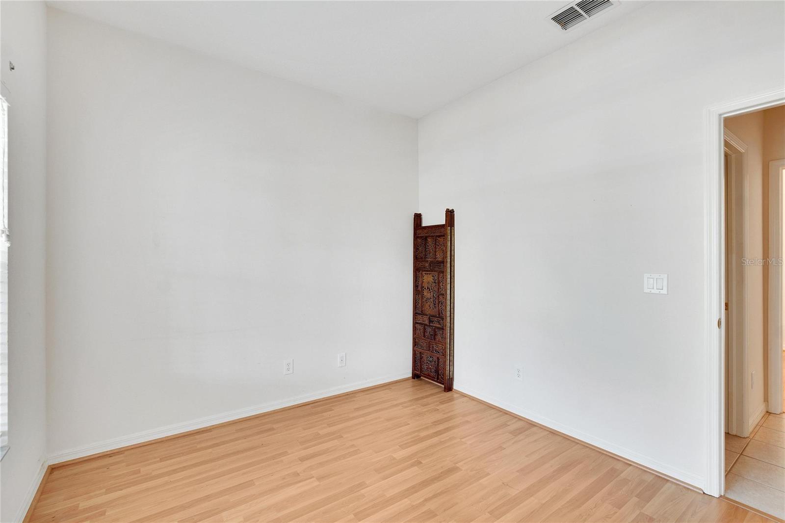 Secondary bedrooms with the shared 2nd bathroom