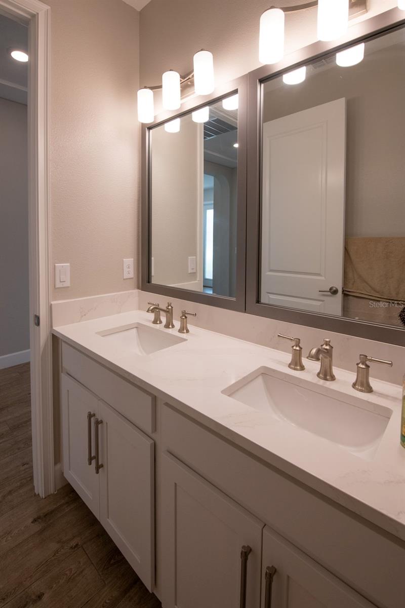 Dual sinks in guest bath.