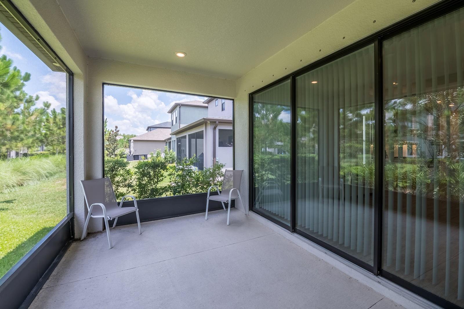 Screened in covered patio.