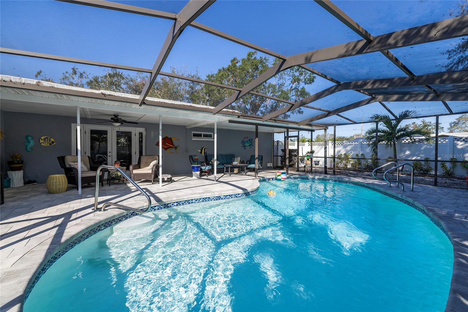 Large, screened pool and patio