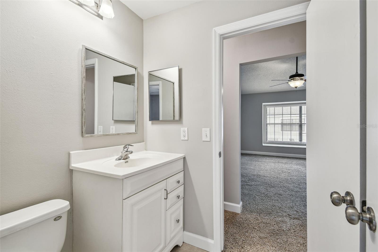 Both the primary and second bedrooms have access to the main bath.