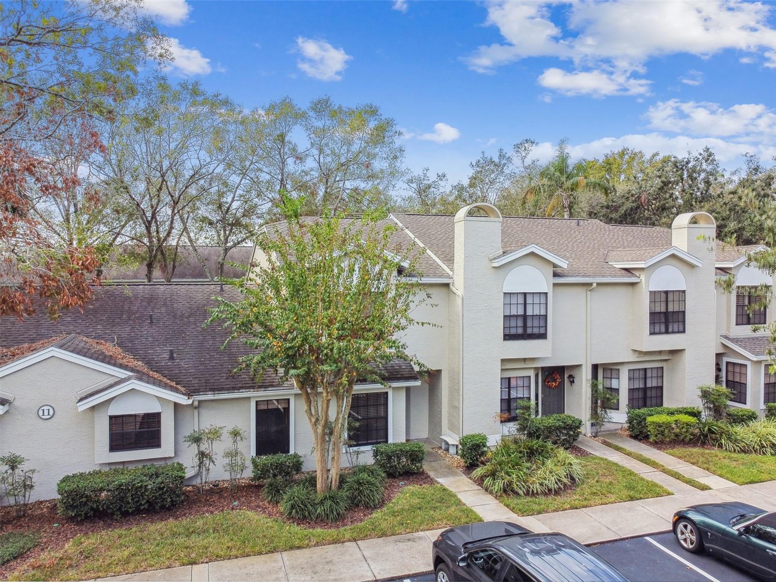 Lush landscaping throughout the community makes it have great curb appeal. There is a dedicated parking space included.