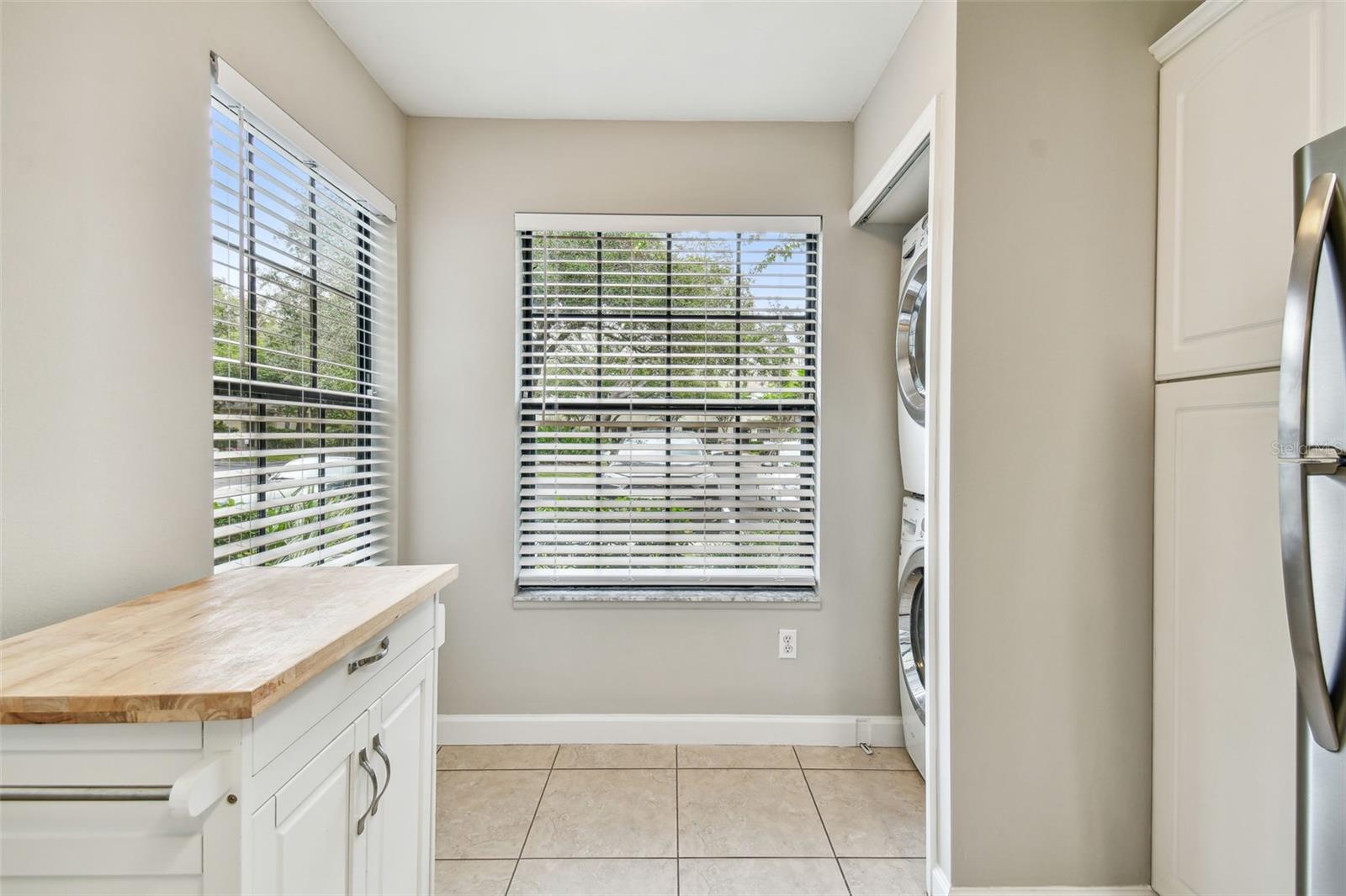 Windows in kitchen bring in natural light.