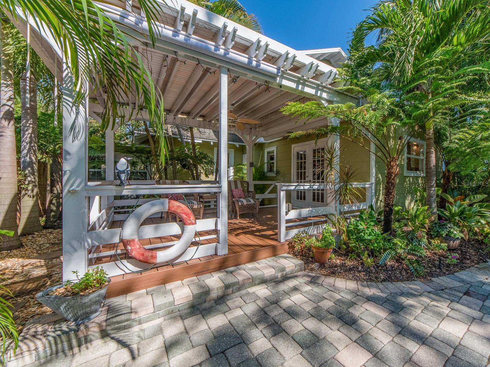 Deck overlooking back yard oasis