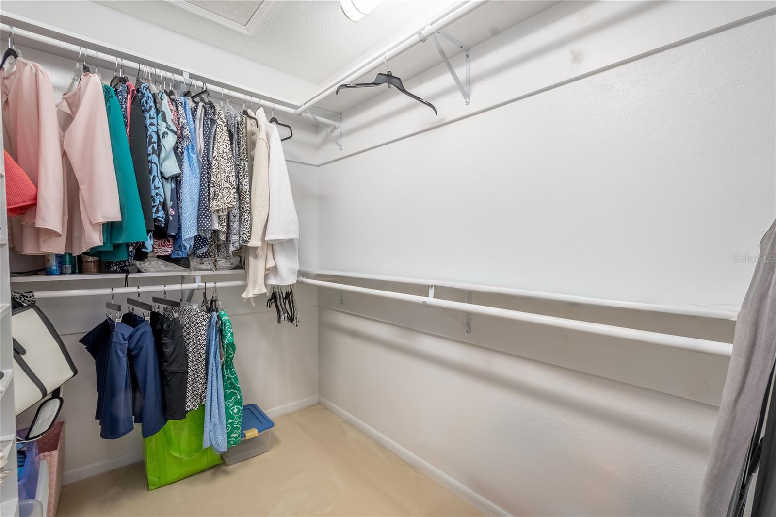 The primary bedroom features a spacious walk-in closet.