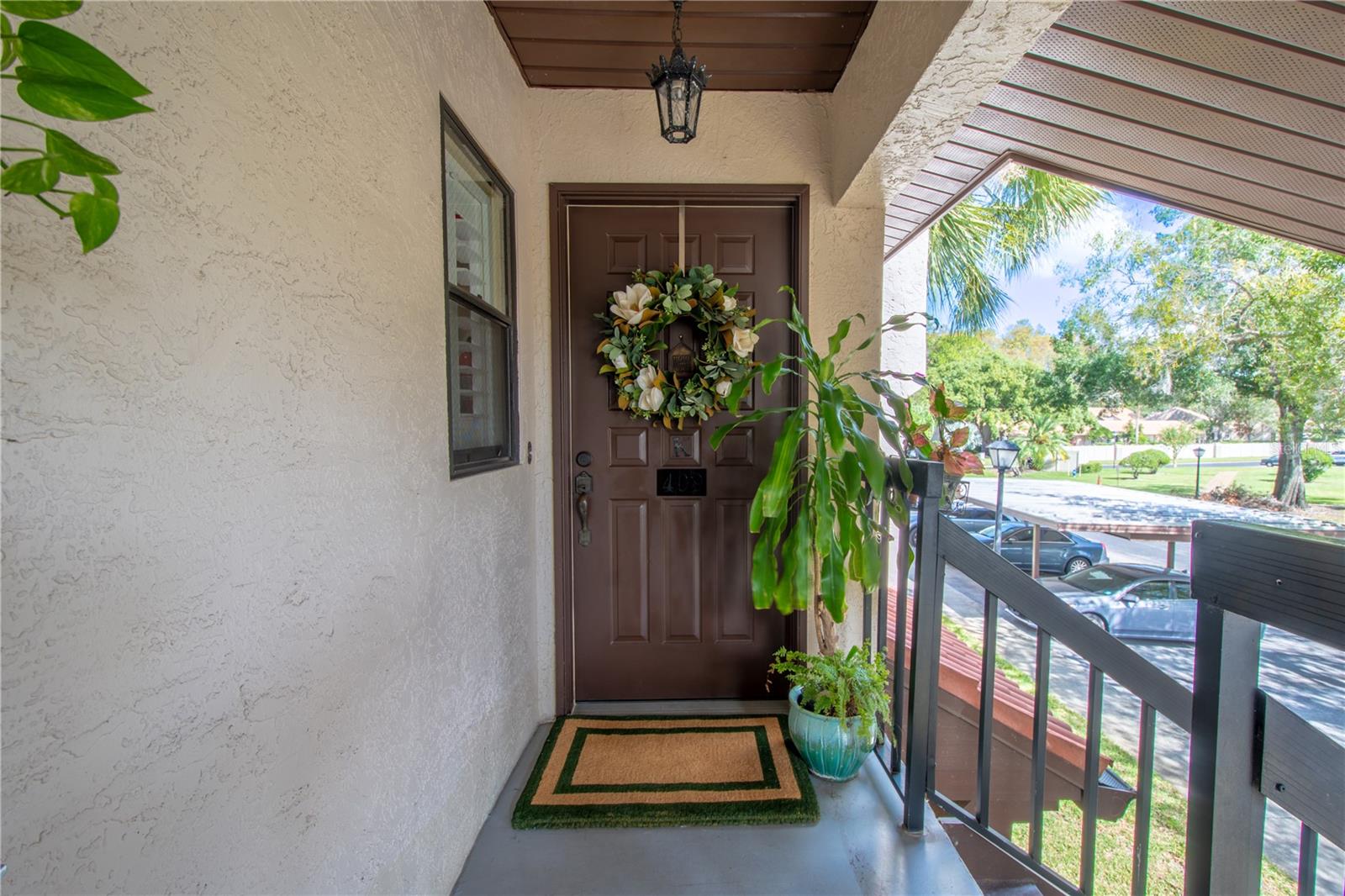 2nd floor unit with covered entryway.