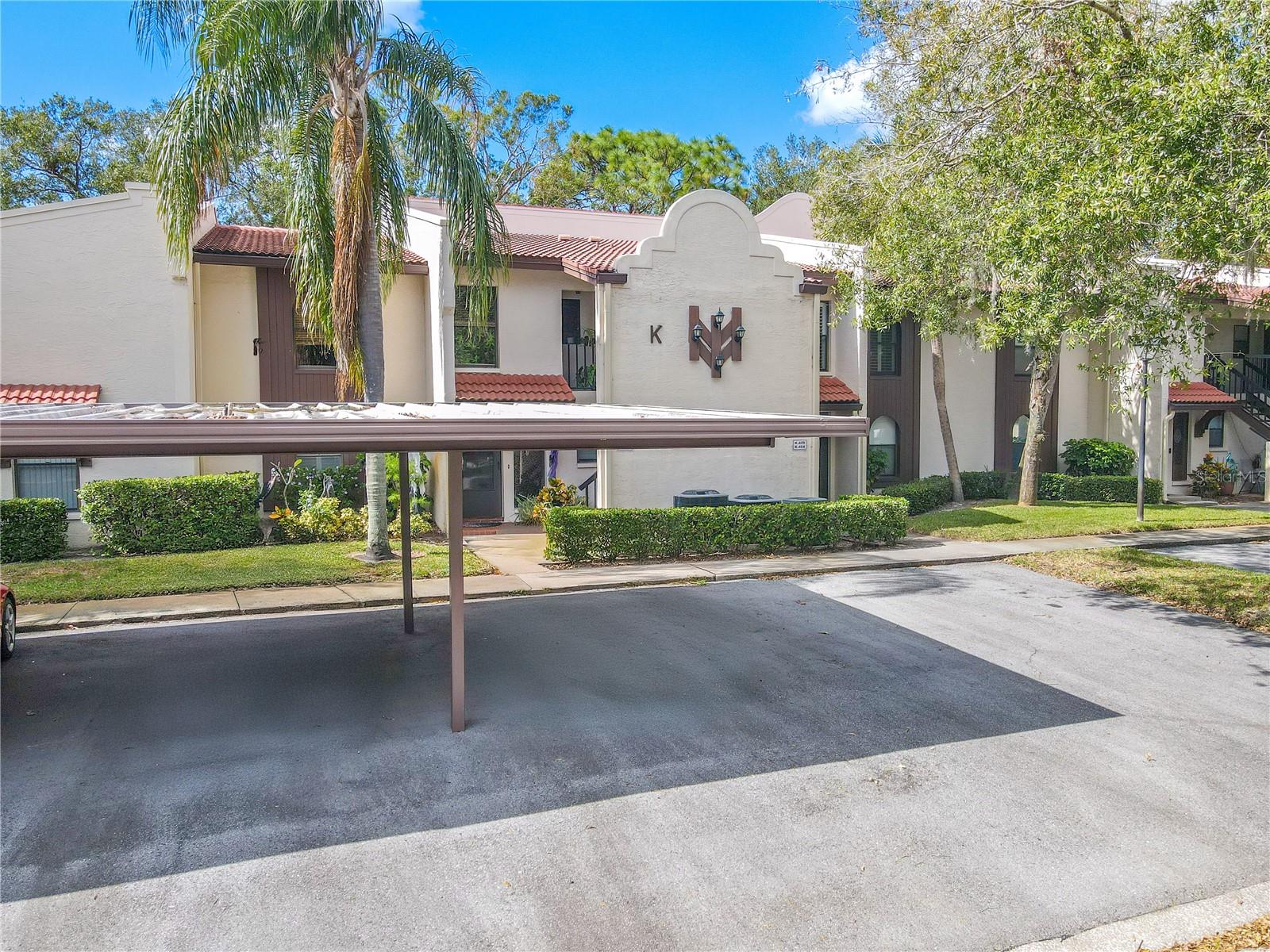 Dedicated parking space in carport.