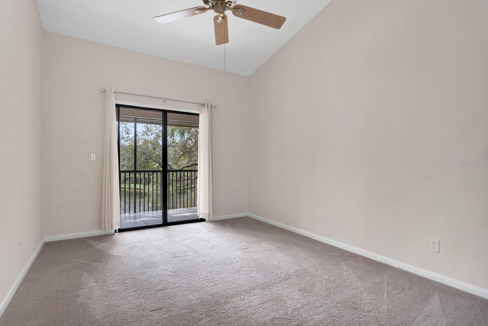 Guest Bedroom with Waterview and Balcony Access