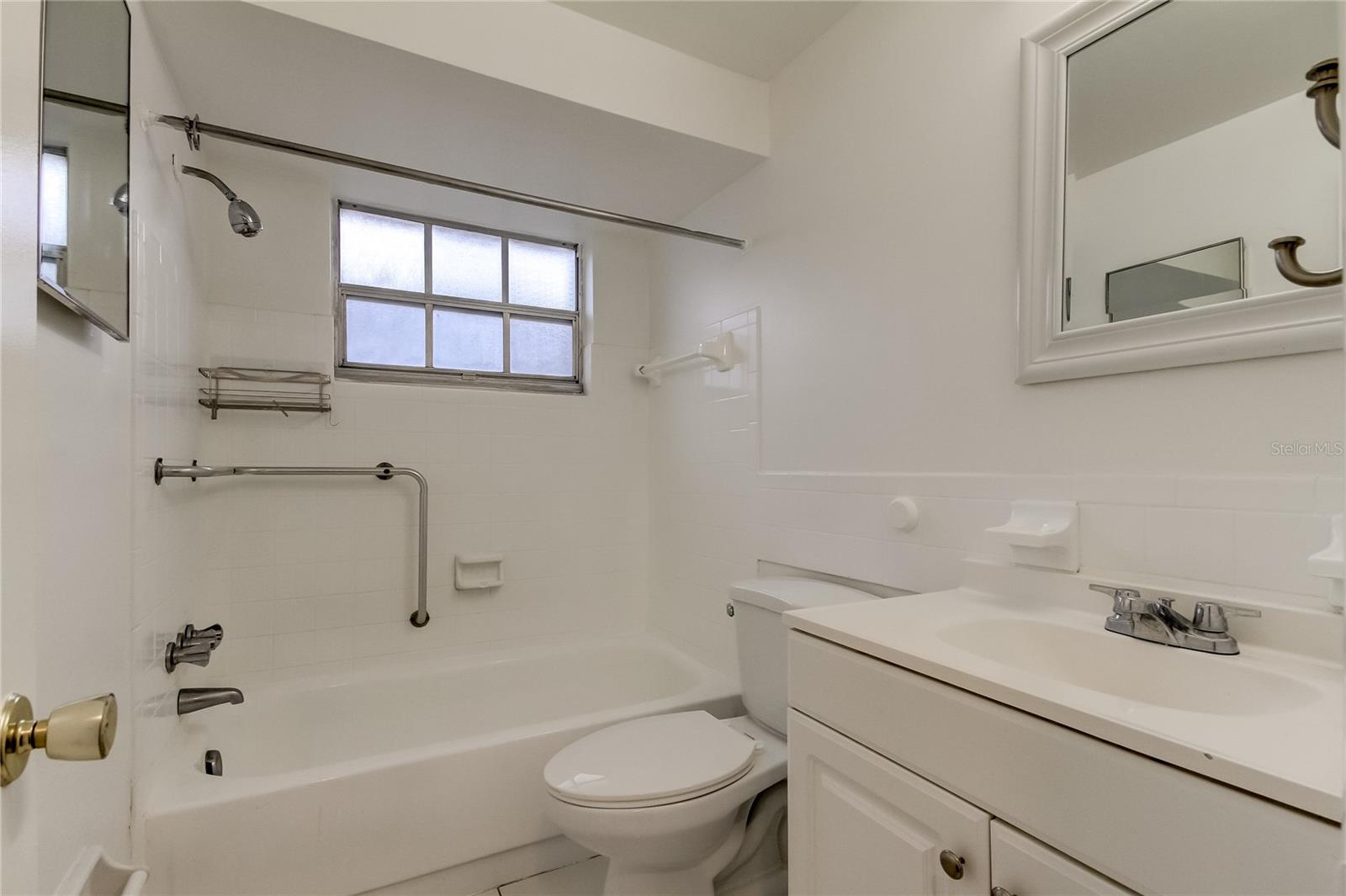 Second Bathroom located in hallway near 2nd Bedroom