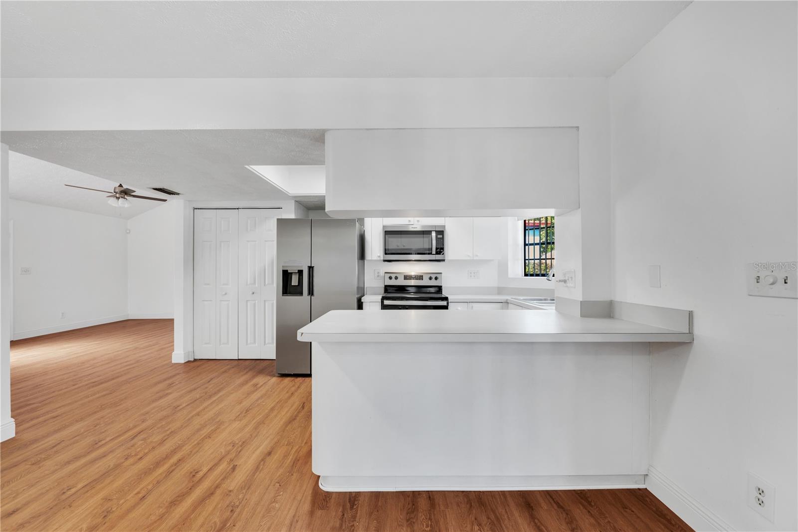 Breakfast bar can accommodate 3 stools.