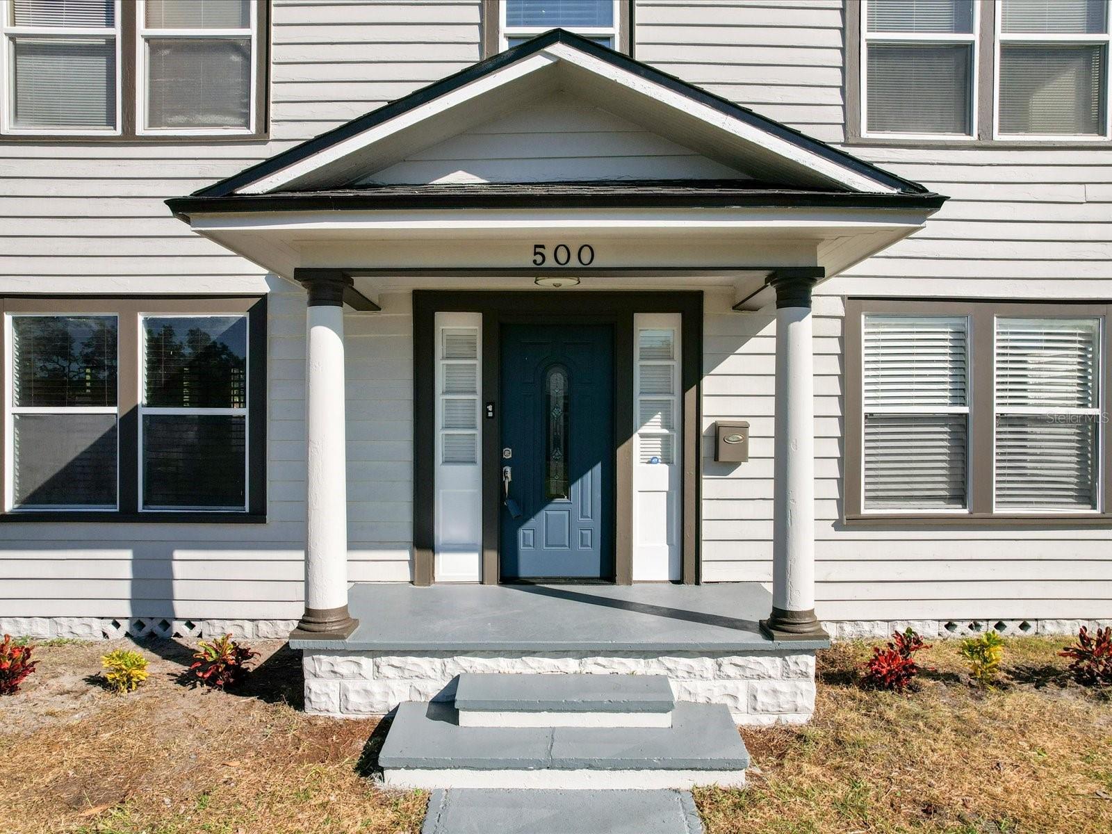 Charming curb appeal approaching the front door