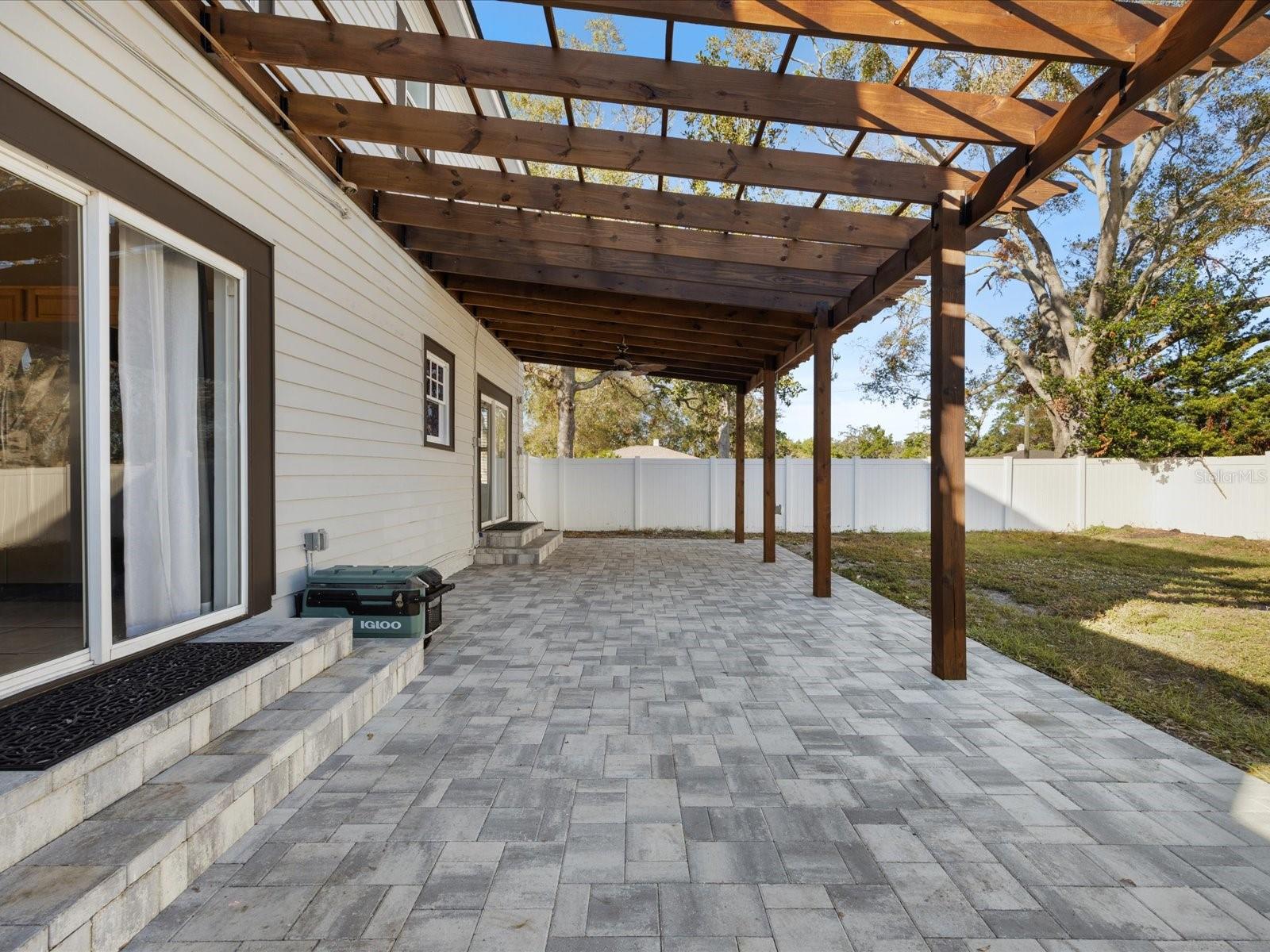 Enjoy outdoor living at its finest under your brand new pergola