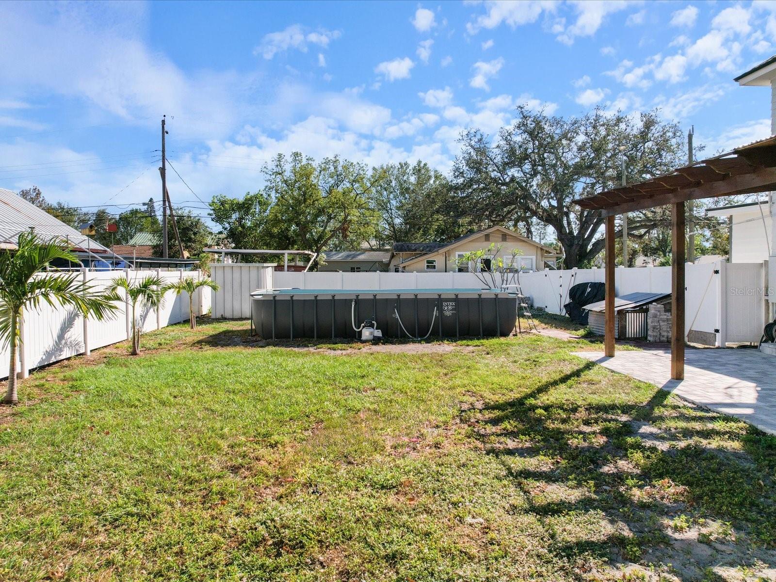 Beautiful white vinyl fence surrounds your property for ultimate privacy