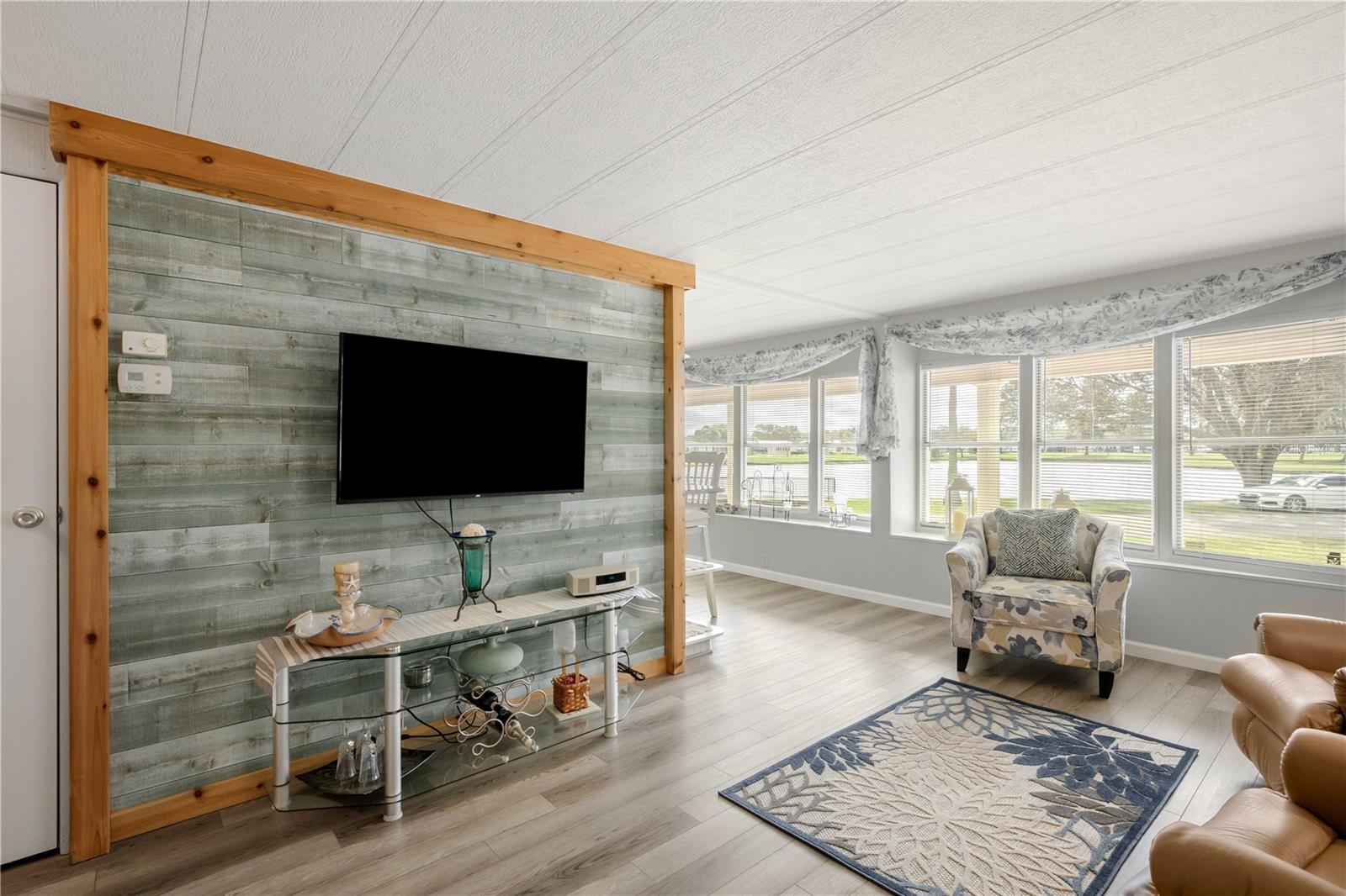 Living room with wood accent wall