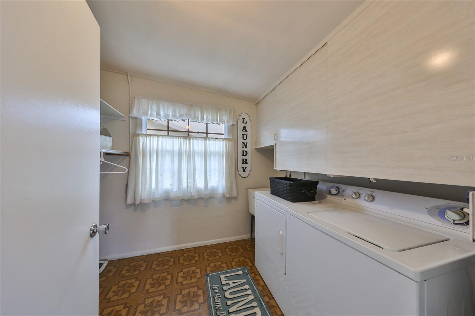 Oversized Laundry Room w/ Storage Cabinets & Shelves