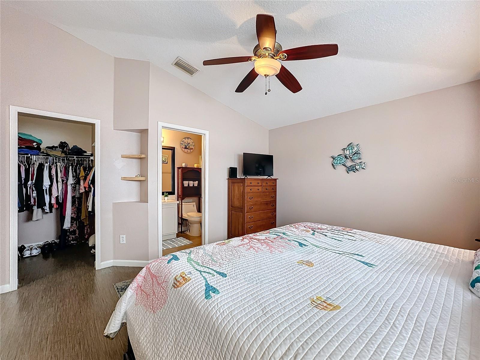 PRIMARY BEDROOM WITH WALK-IN CLOSET AND EN SUITE BATHROOM