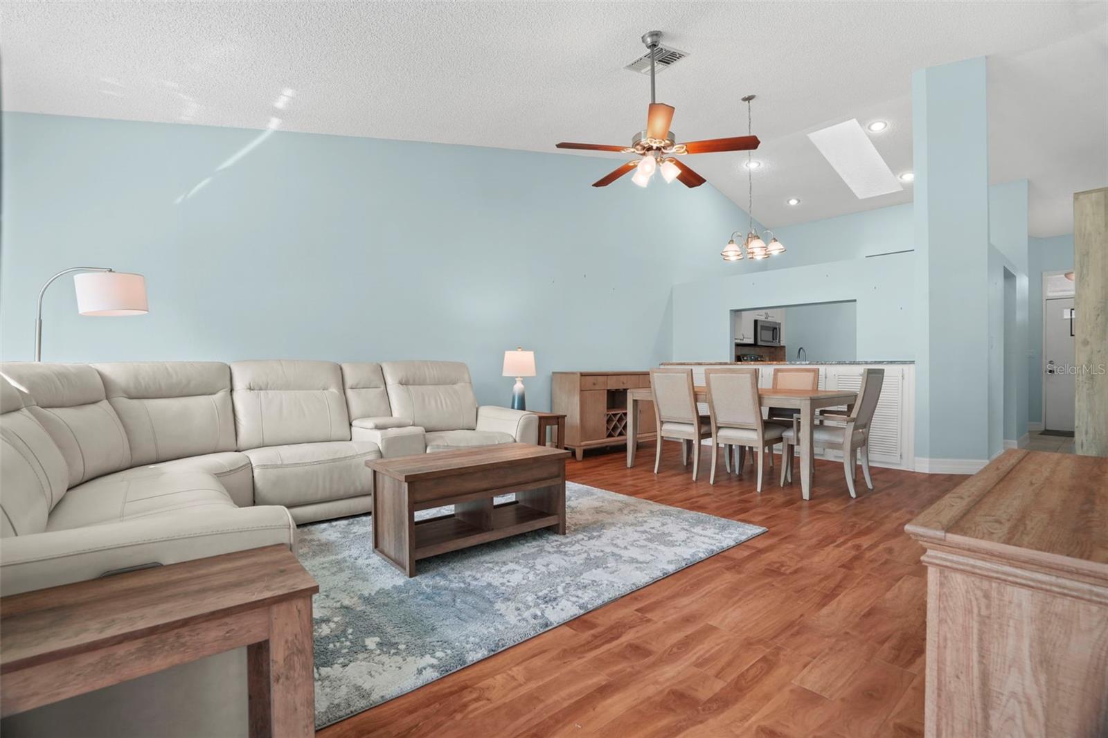 Open floor plan highlighted by vaulted ceilings.