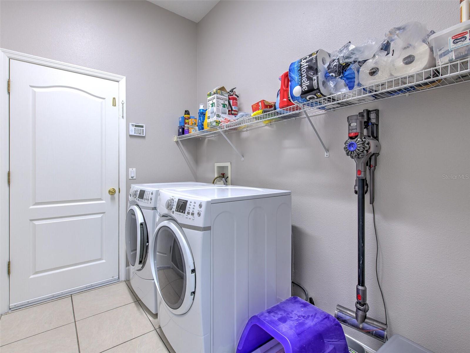 Laundry room leads to the 3 car garage