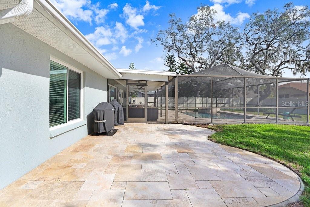 Outside the patio, there's another patio! Perfect for a firepit, grilling area, or another relax zone.