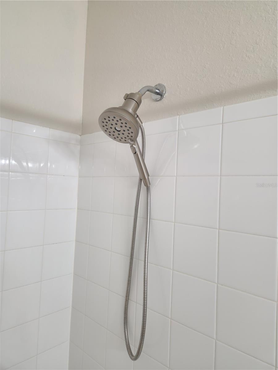 Recent updated shower fixture in main bathroom