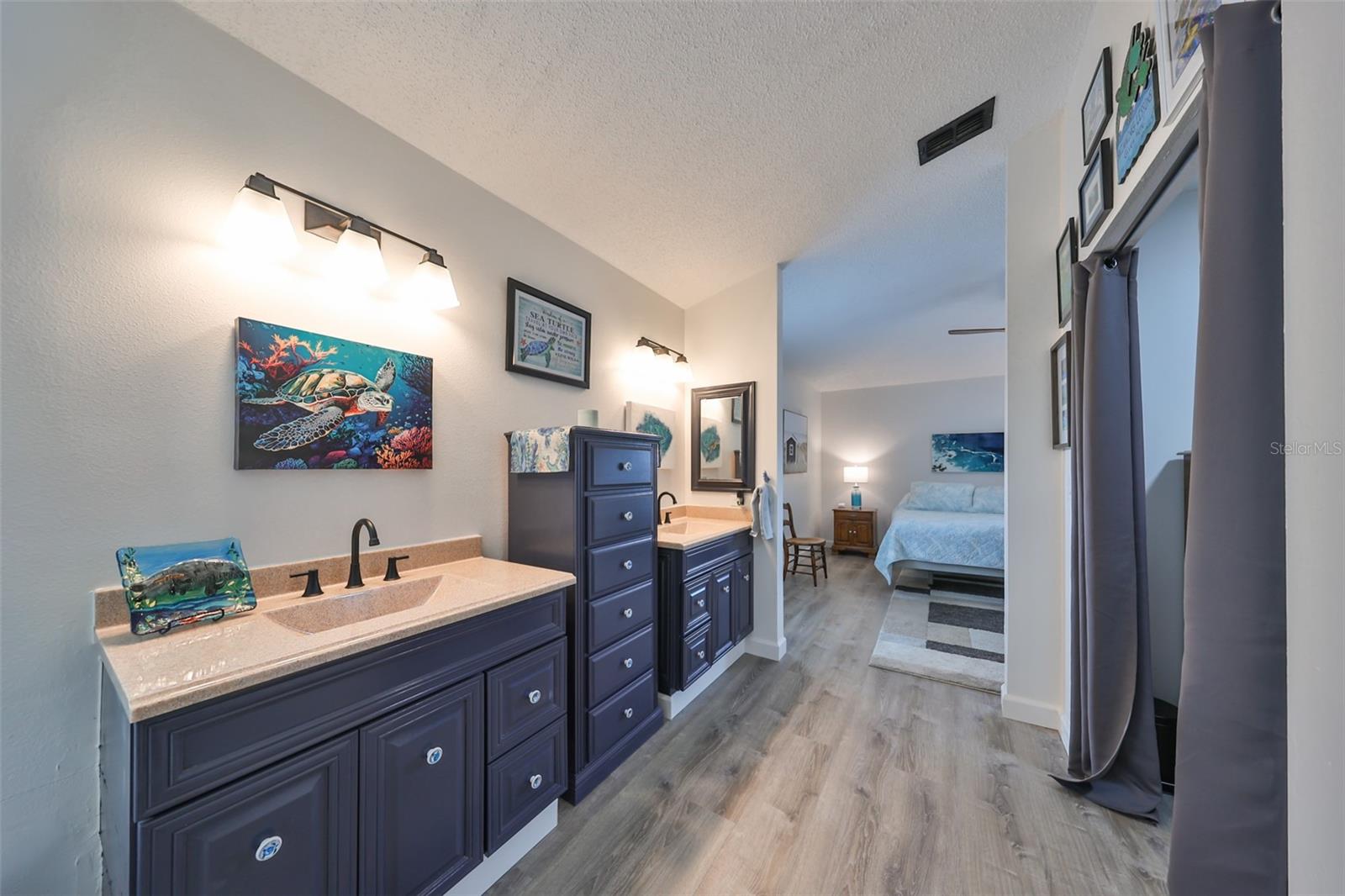 Primary Bathroom - Dual sinks w/Quartz Counters & chest of drawers